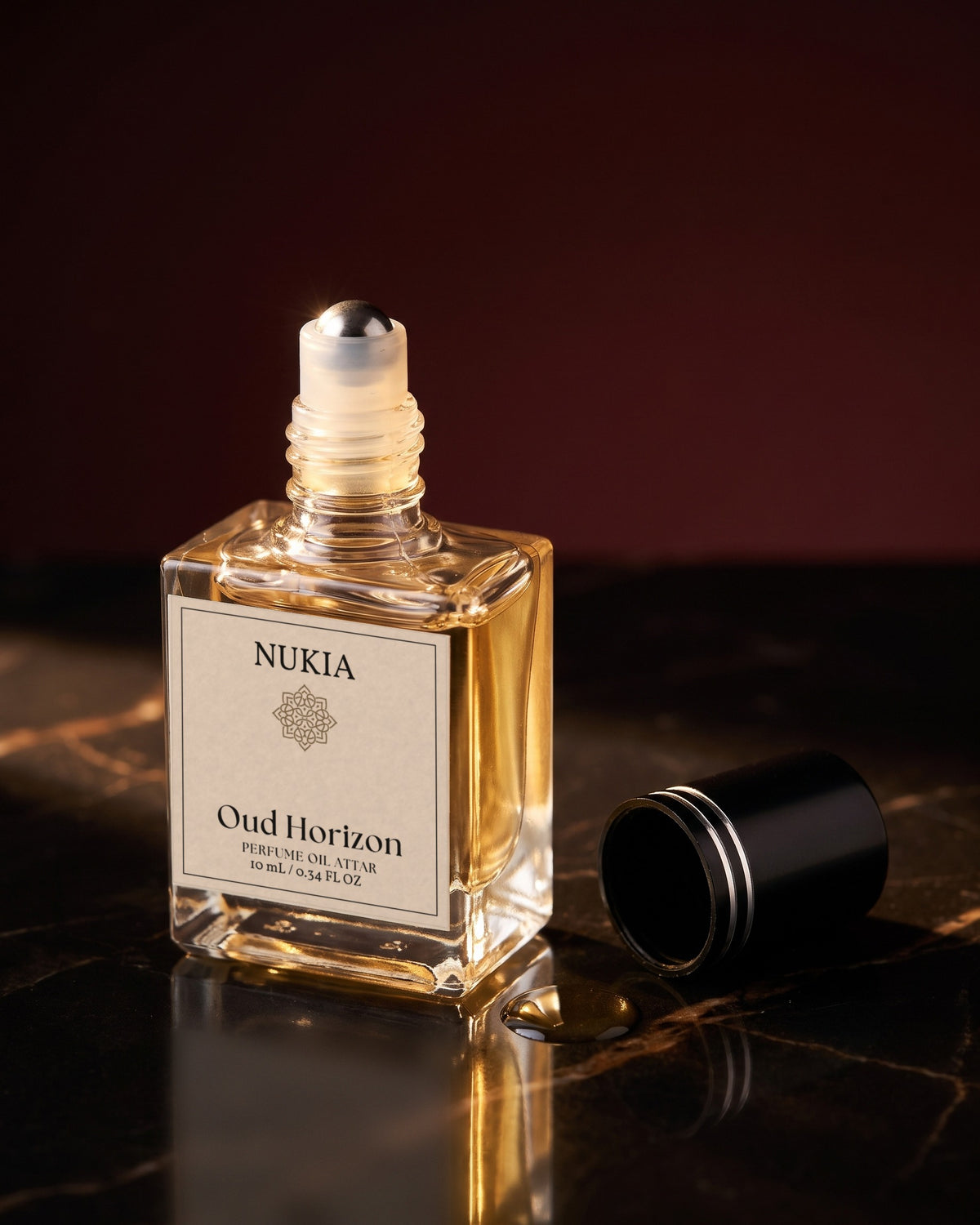 Oud Horizon with the cap off, showing the rollerball