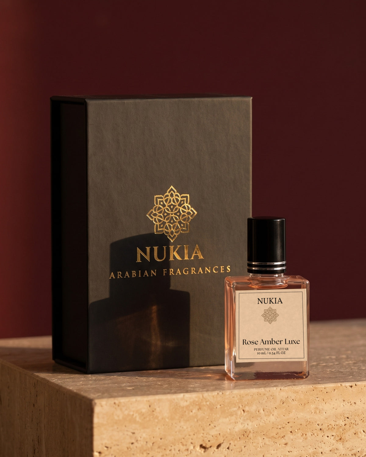 Rose Amber Luxe perfume oil with its black Nukia gift box